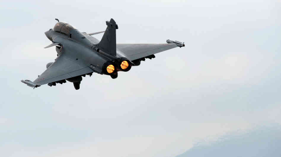 A Rafale jet takes off from the Solenzara base on the French island of Corsica for a mission in Libya on March 26.