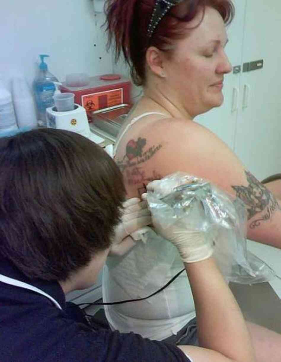 "Bret's signature being tattooed on my shoulder under a tattoo of the Poison song 'Every Rose Has Its Thorn.'" 