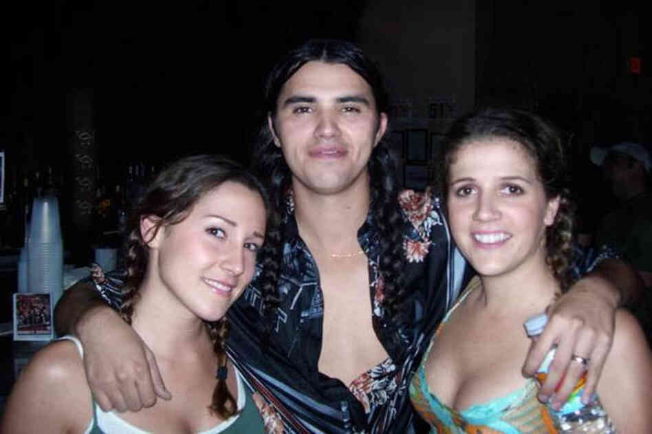 "My friend, Kim; Aaron Behrens of Ghostland Observatory, and me after a concert in Houston. Kim and I both have braided pigtails in our hair just like Aaron." 