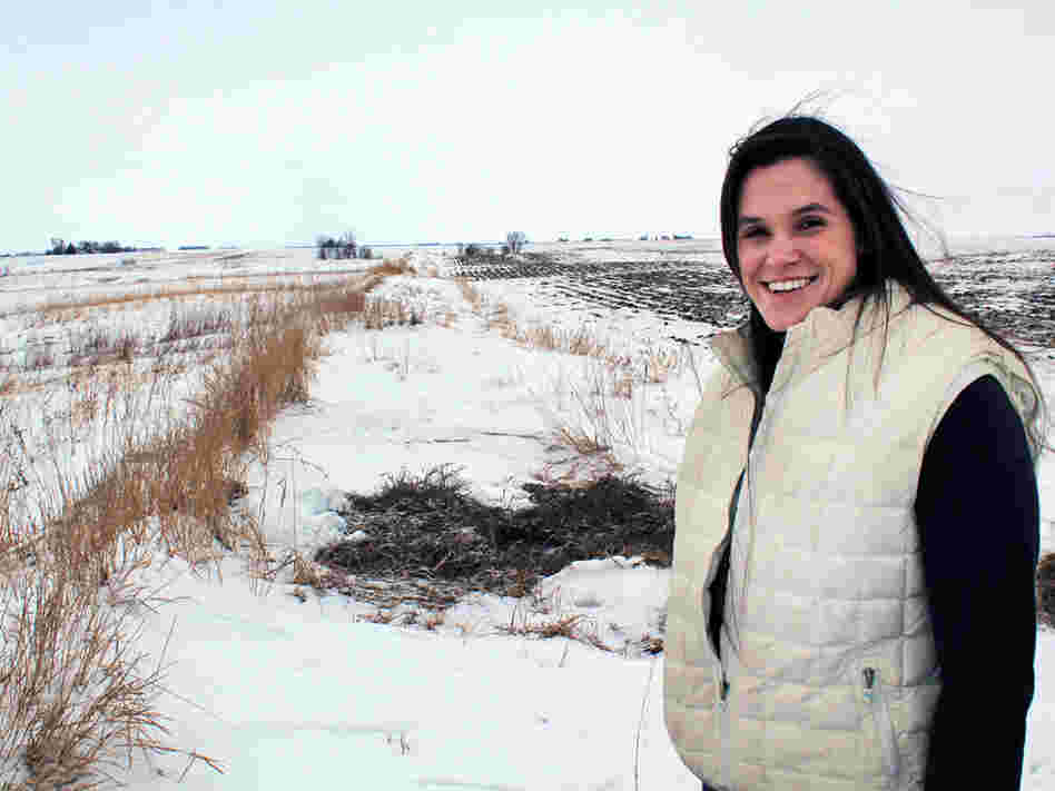 Betsy Dahl stands on the 180 acres of land that she farms for Helen Gunderson, which she is converting to organic. Dahl is one of a growing number of young women getting into farming. Betsy Dahl stands on the 180 acres of land that she farms for Helen Gunderson, which she is converting to organic. Dahl is one of a growing number of young women getting into farming.