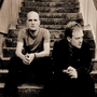 Brothers Stijn (left) and Steven Kolacny lead the Scala and Kolacny Brothers choir as conductor and pianist, respectively. Brothers Stijn (left) and Steven Kolacny lead the Scala and Kolacny Brothers choir as conductor and pianist, respectively.
