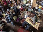 Refugees gather in Abidjan, Ivory Coast. Refugees gather in Abidjan, Ivory Coast.