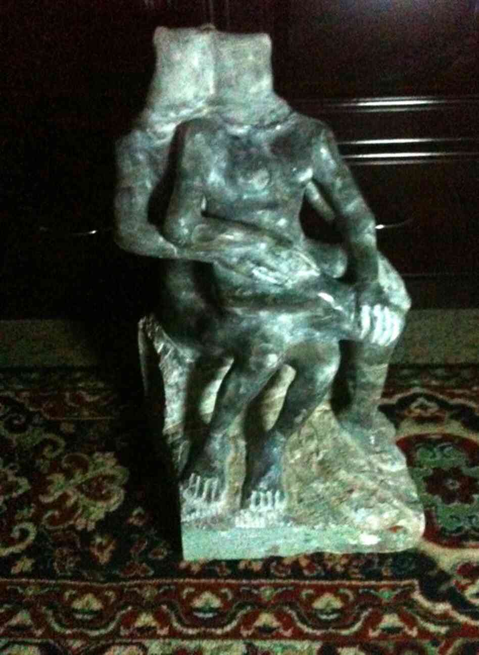 Artist Abdel-Karim Khalil is an Iraqi sculptor based in Iraq. He says his latest pieces are inspired by images of the war. He poses his sculptures in the classical style but he adds jarring details, like the bag over the figures's head here, to symbolize torture. 