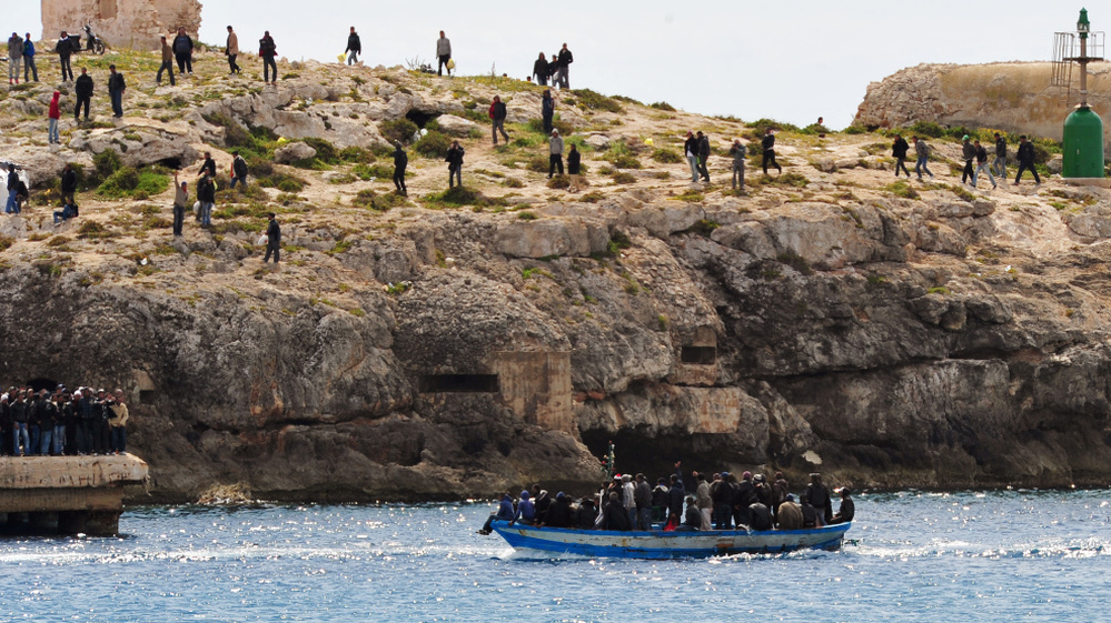 North African refugees arrive at Lampedusa, Italy on March 30, 2011.