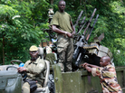 Fighters loyal to the country's U.N.-backed leader, Alassane Ouattara, in Duekoue, western Ivory Coast, on March 29, 2011. Fighters loyal to the country's U.N.-backed leader, Alassane Ouattara, in Duekoue, western Ivory Coast, on March 29, 2011.