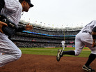 In the Bronx, Yankees (left to right) Nick Swisher, Derek Jeter and Curtis Granderson took the field earlier this afternoon for their game against the Detroit Tigers. In the Bronx, Yankees (left to right) Nick Swisher, Derek Jeter and Curtis Granderson took the field earlier this afternoon for their game against the Detroit Tigers.