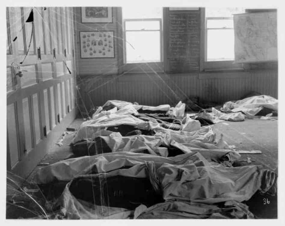 Covered Bodies in Schoolroom after 1900 Scofield Mine DisasterNote: On May 1, 1900, there was an explosion at a coal mine in Scofield. For the next two days, the people of Scofield and nearby Clear Creek tended to the dead and wounded as best as they could. Anderson made an extensive photographic record of the event.