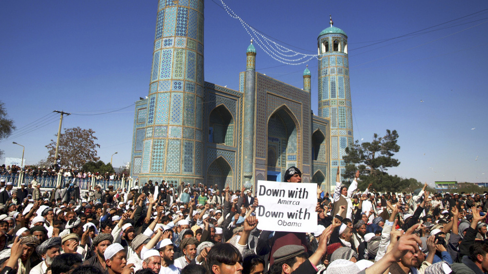 Afghans chant anti-U.S. slogans during a demonstration   in Mazar-i-Sharif, north of Kabul, on Friday.