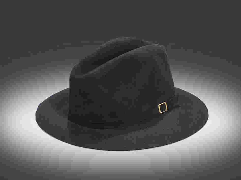Michael Jackson's Victory Tour Black FedoraInside the hat is a black leather band stamped "By Maddest Hatter ... Made expressly for Michael Jackson ... 100 percent genuine fur." The hat was caught by an audience member attending the July 31, 1984, Jackson concert at Giants Stadium in East Rutherford, N.J.