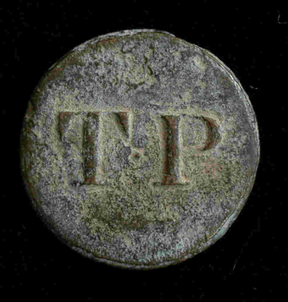 Thomas H. Porter Slave Buttons, c. 1820Thomas H. Porter, a slave trader based in Barbados, sold slaves along the coasts of Alabama, Louisiana, Mississippi, Georgia and the Carolinas, circa 1815-1830. He attached these buttons to the enslaved person's clothing during auctions.