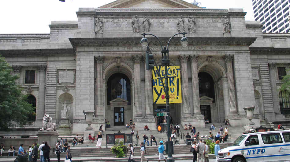 Pedestrians walk past the main building of the New York Public Library. But will they be going in to check out books in the future? Pedestrians walk past the main building of the New York Public Library. But will they be going in to check out books in the future?