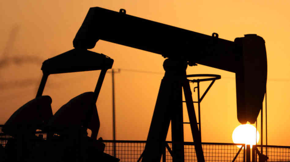 An oil rig is seen at sunset in the desert oil field of Sakhir, Bahrain. The country is a major regional banking and financial hub. But recent political unrest is forcing some analysts to wonder if foreign investors are already looking for another place to send their money. An oil rig is seen at sunset in the desert oil field of Sakhir, Bahrain. The country is a major regional banking and financial hub. But recent political unrest is forcing some analysts to wonder if foreign investors are already looking for another place to send their money.