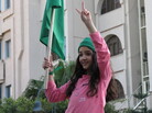 Young people rally in front of the United Nations office in downtown Tripoli in support of Libyan leader Moammar Gadhafi on March 28. Impromptu rallies like this have been common in Tripoli in recent weeks. Young people rally in front of the United Nations office in downtown Tripoli in support of Libyan leader Moammar Gadhafi on March 28. Impromptu rallies like this have been common in Tripoli in recent weeks.