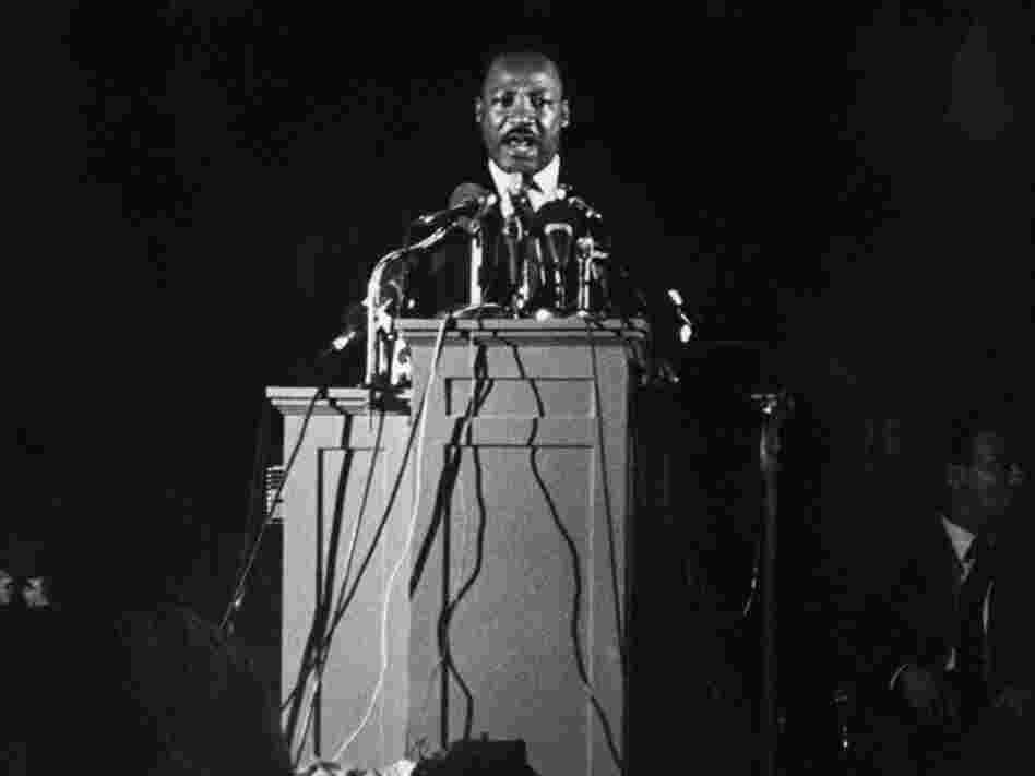 Martin Luther King addresses 2,000 supporters of a sanitary workers' strike at Memphis during his last speech Apr. 4, 1968 night.