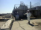 A TEPCO employee points at a crack discovered April 1 in a maintenance pit on the edge of the Fukushima Dai-ichi nuclear nuclear power plant in northeastern Japan. A TEPCO employee points at a crack discovered April 1 in a maintenance pit on the edge of the Fukushima Dai-ichi nuclear nuclear power plant in northeastern Japan.