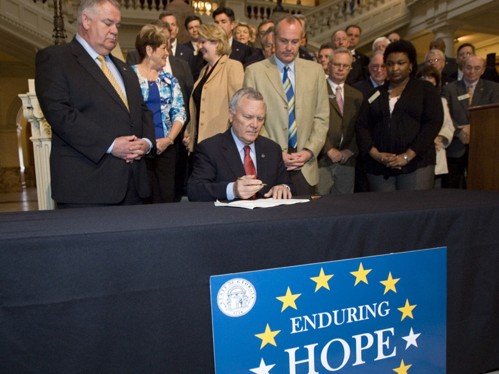 Georgia Gov. Nathan Deal signed the HOPE scholarship funding cuts into law on March 15.