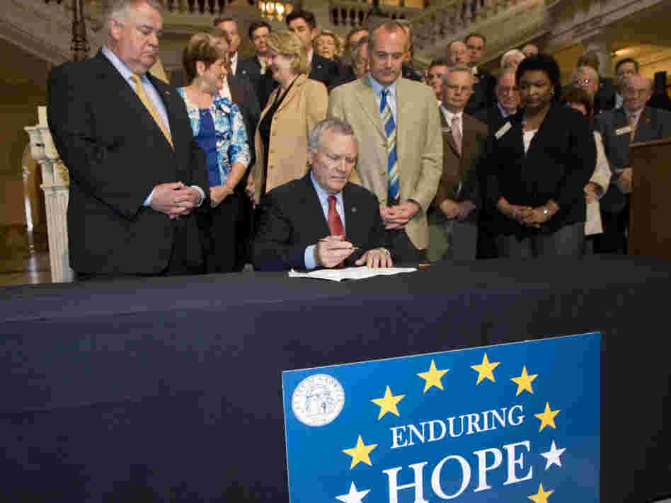 Georgia Gov. Nathan Deal signed the HOPE scholarship funding cuts into law on March 15.