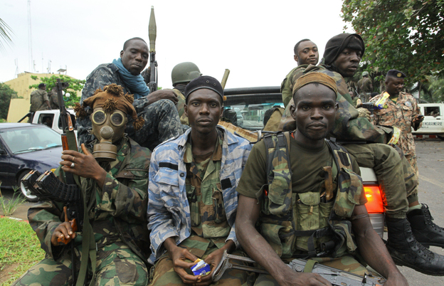 Fighters loyal to Ivory Coast President-elect Alassane Ouattara prepared for an assault in the city of Abidjan on Tuesday.