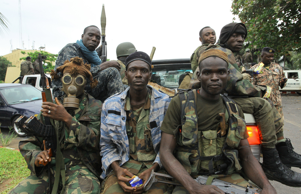 Fighters loyal to Ivory Coast President-elect Alassane Ouattara prepared for an assault in the city of Abidjan on Tuesday.