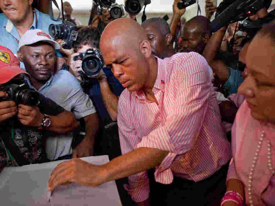 Then-candidate Michel Martelly casts his ballot at a polling station during a presidential runoff in Port-au-Prince, on March 20. Then-candidate Michel Martelly casts his ballot at a polling station during a presidential runoff in Port-au-Prince, on March 20.