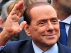 Italian Prime Minister Silvio Berlusconi acknowledges his supporters after a legal hearing on March 28. Italian Prime Minister Silvio Berlusconi acknowledges his supporters after a legal hearing on March 28.
