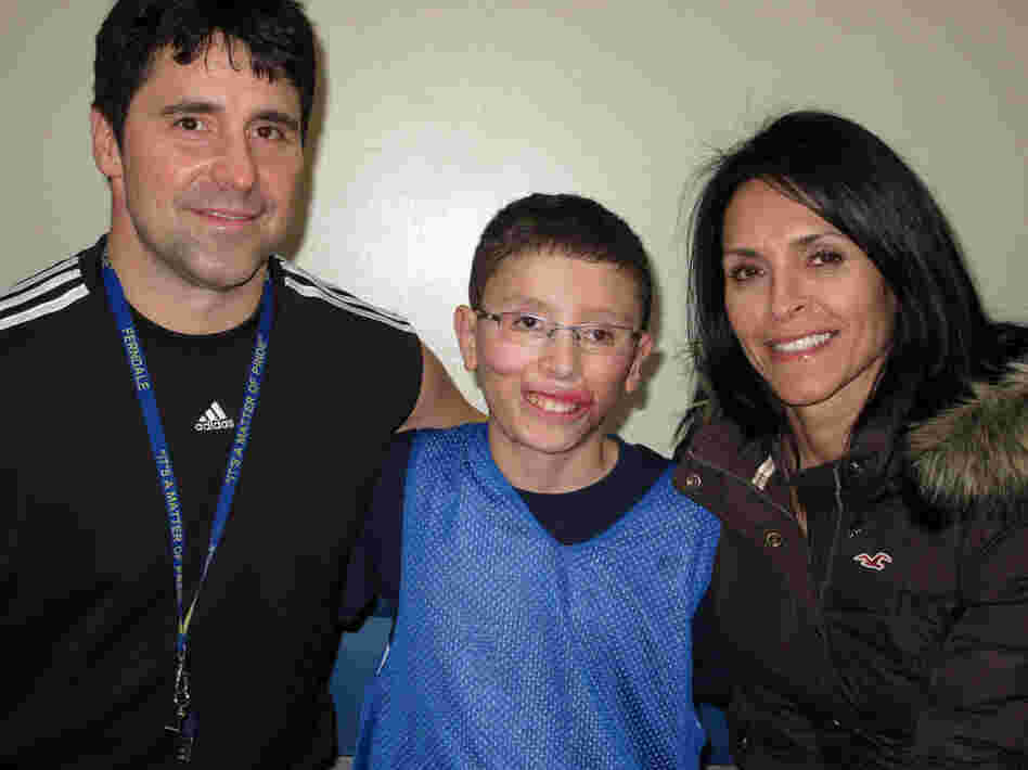 Jake Finkbonner, shown with his father, Donny, and mother, Elsa, nearly died after contracting a flesh-eating bacterium. His family and friends prayed for a miracle, and now the Vatican is investigating whether one actually occurred.