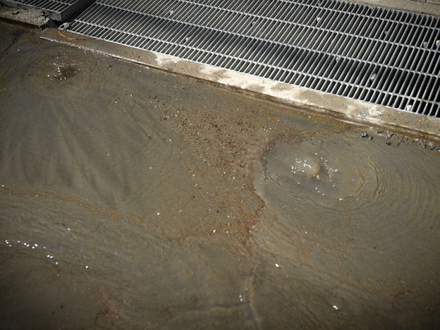 Bubbling water is seen in Chiba, Japan, on March 19, a week after the earthquake. The shaking caused by the earthquake triggered liquefaction, which allows sand and water underground to rise.