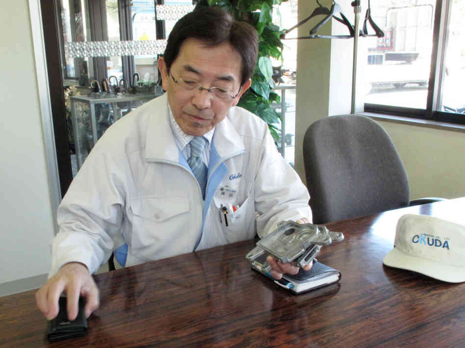 "In order to make a car, all the parts have to be available," Okuda Industries President Kiyohito Okuda says. "We can be at full production here, but if plants in other areas are shut down and parts are missing, you can't make a car." "In order to make a car, all the parts have to be available," Okuda Industries President Kiyohito Okuda says. "We can be at full production here, but if plants in other areas are shut down and parts are missing, you can't make a car."