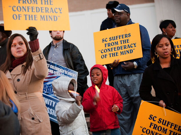 Members of the Charleston branch  of the NAACP gather in December 2010 to protest a Secession Ball commemorating  South Carolina's decision to secede.