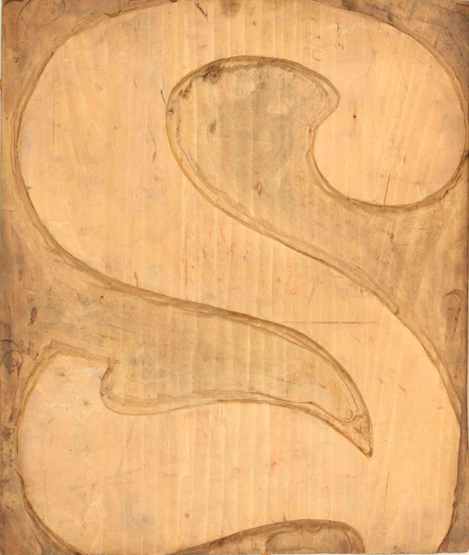 Printmaker Mary Mashburn says nicks and cuts like the ones in this old Globe woodblock lend character to the posters' lettering. Printmaker Mary Mashburn says nicks and cuts like the ones in this old Globe woodblock lend character to the posters' lettering.