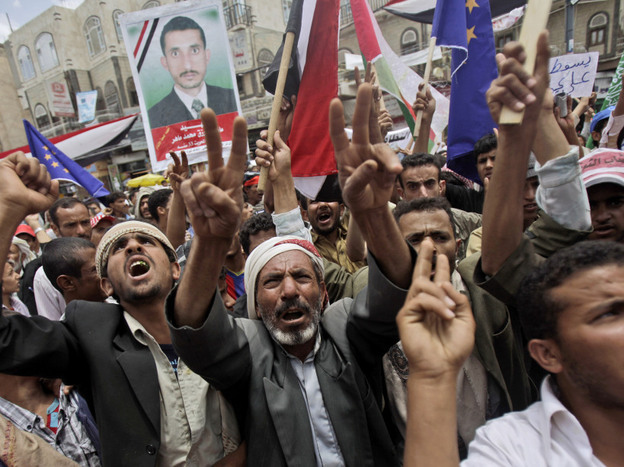 Global economic meetings in Washington, D.C., this week take place as protesters, like these in Sanaa, Yemen, demonstrate for the overthrow of governments and measures to address poverty.