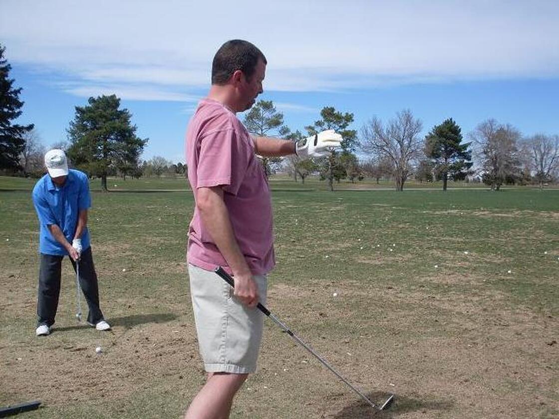 Seasoned golfer Joe Frey tests out the SensoGlove in Denver.