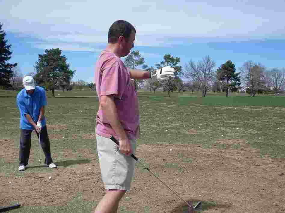 Seasoned golfer Joe Frey tests out the SensoGlove in Denver.