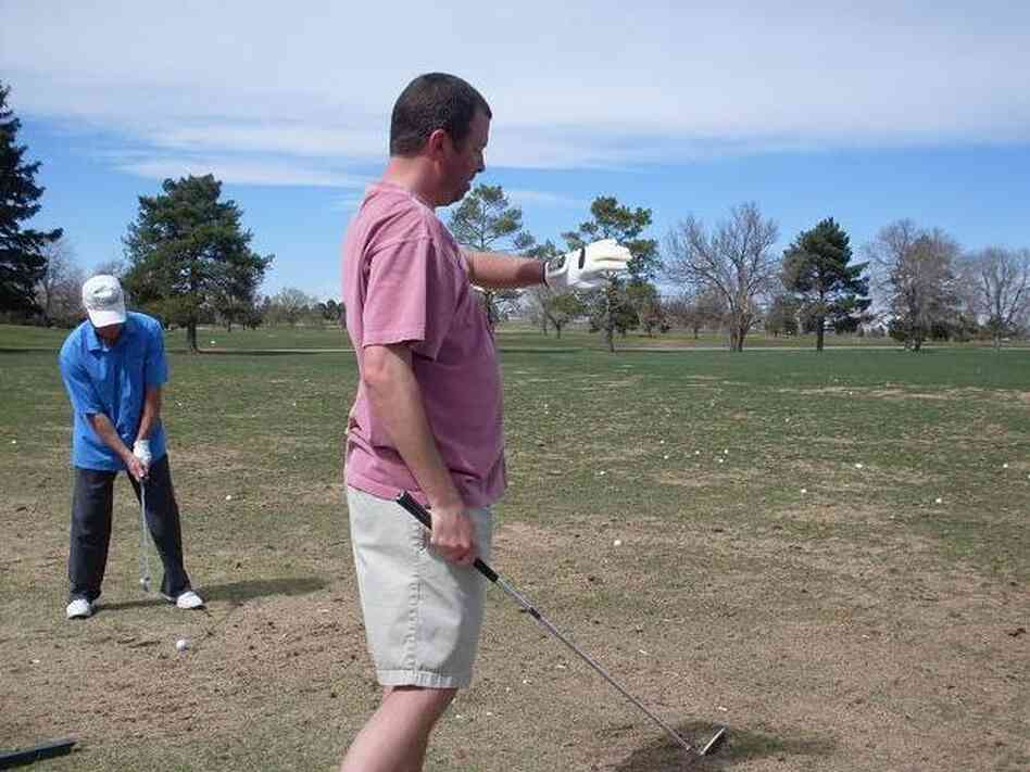 Seasoned golfer Joe Frey tests out the SensoGlove in Denver.