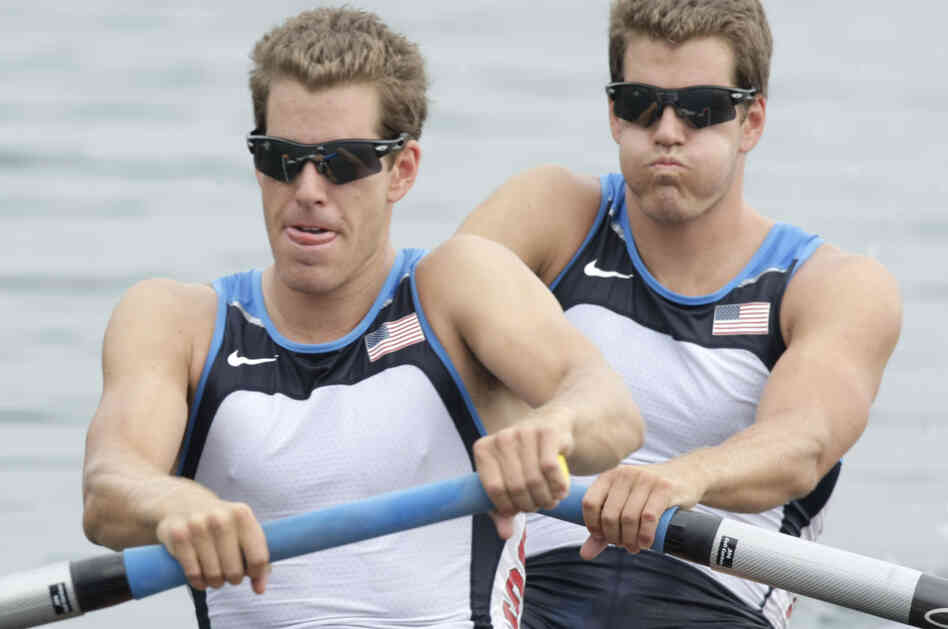 Cameron Winklevoss, left, and twin brother Tyler take the start of the Men's pair repechage  at the Beijing 2008 Olympics.