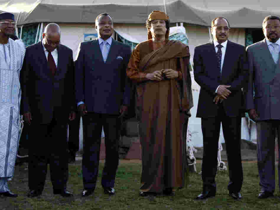 Libyan leader Moammar Gadhafi (third from right) stood with five delegates of the African Union after negotiations Sunday at his Bab al-Aziziya compound in Tripoli. From left: Presidents Amadou Toumani Toure of Mali, Jacob Zuma of South Africa, Denis Sassou Nguesso of Congo and Mohamed Ould Abdel Aziz of Mauritania, and African Union Commission Chairman Jean Ping.