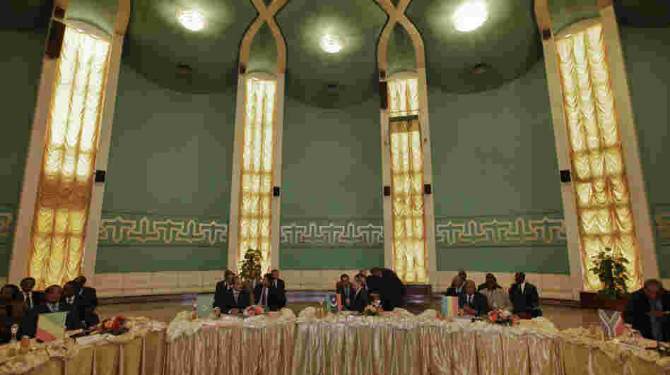 African Union delegates met with Libyan opposition leaders Monday at the Tibesty Hotel in Benghazi. Hundreds of people demonstrated outside the negotiations, saying there can be no peace in Libya until Moammar Gadhafi is gone.