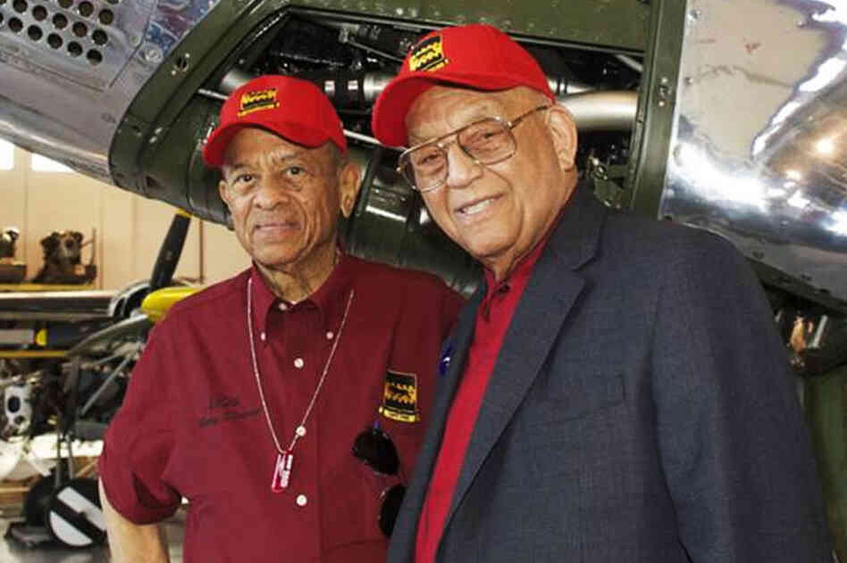 Harry Stewart (left) and Robert Friend at the Red Tail reunion in Orlando, Fla., in March. Stewart shot down three German fighter planes in one day, and later won a much-coveted Top Gun contest. More than 60 years ago, he went to Friend's house for dinner, and as he puts it, "Dinner was so much fun, I married his sister."  