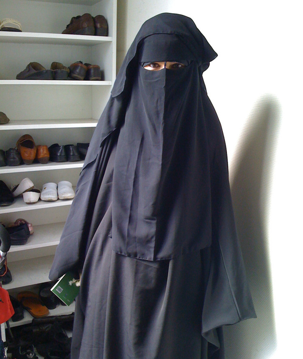 Someya, 22, who declined to give her last name, is among a small number of women in France who wear the full niqab. She wears it "for God and for my husband, so that he'll be the only person who can see me and be able to appreciate my face," she says. But she'll take it off because of France's new law, she says.