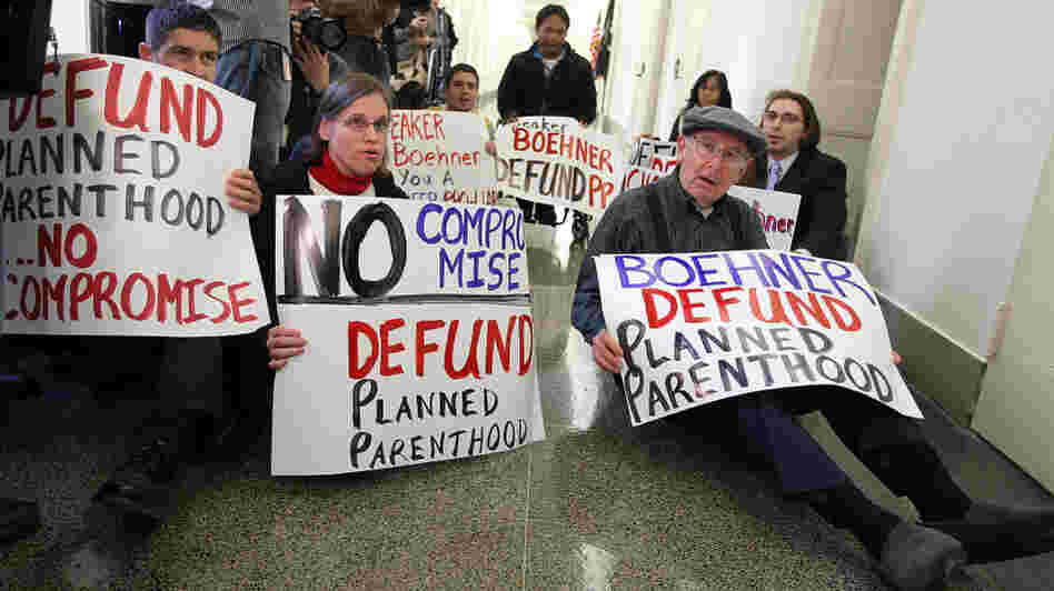 Anti-abortion activists protest outside the office of House Speaker John Boehner (R-OH) in February.