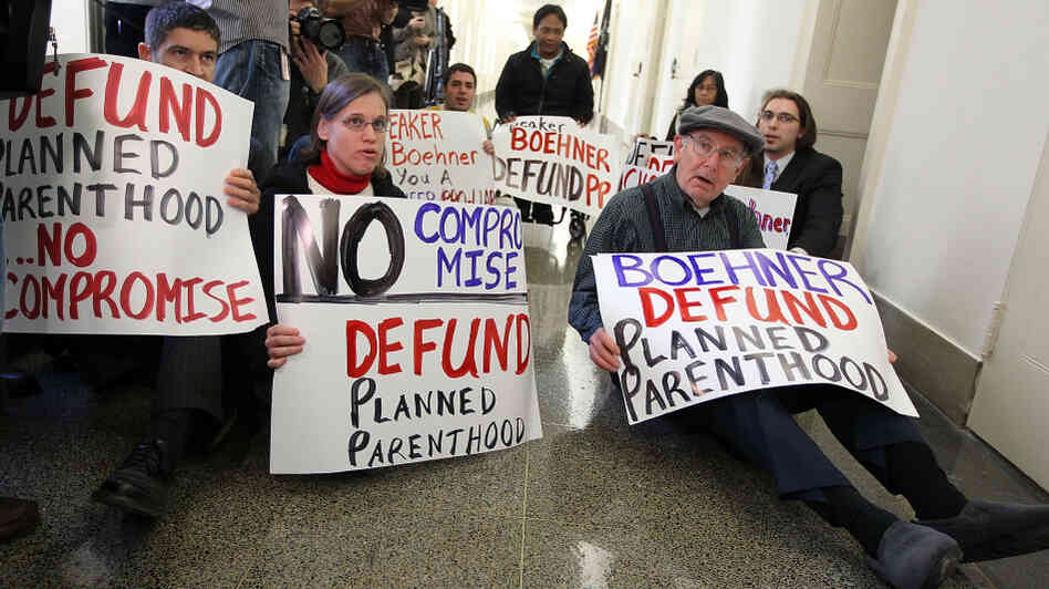 Anti-abortion activists protest outside the office of House Speaker John Boehner (R-OH) in February.