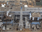 The Fukushima Dai-Ichi plant Reactor Numbers Three and Four on March 20, 2011. Smoke rises over Three. The Fukushima Dai-Ichi plant Reactor Numbers Three and Four on March 20, 2011. Smoke rises over Three.