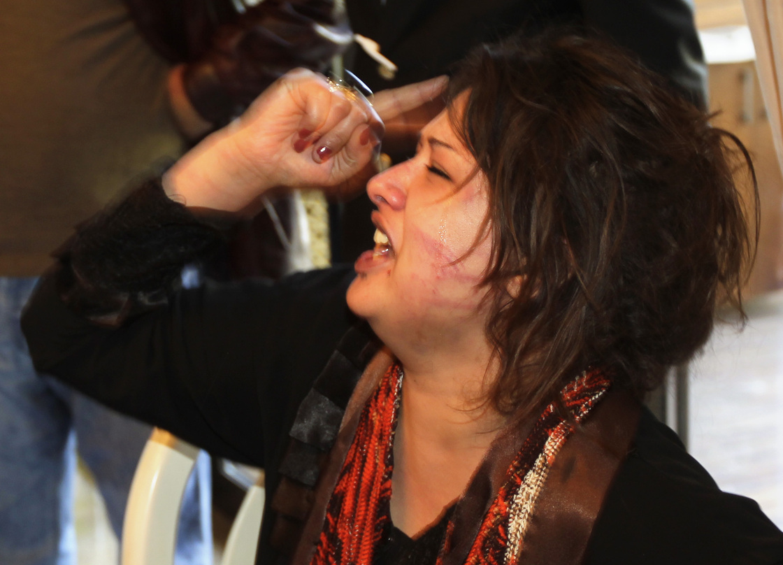 Iman al-Obeidi shouted as she told her story at the Rixos hotel in Tripoli on Saturday (March 26, 2011).