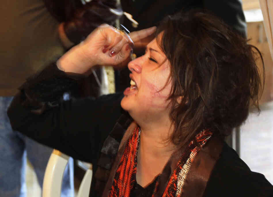 Iman al-Obeidi shouted as she told her story at the Rixos hotel in Tripoli on Saturday (March 26, 2011).