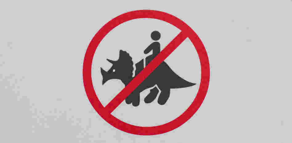 A warning sign to avoid the urge at the Royal Tyrrell Museum in Drumhiller, Alberta. A warning sign to avoid the urge at the Royal Tyrrell Museum in Drumhiller, Alberta.