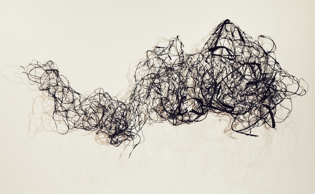 Wall Tapestry is made from shreds of old tires that artist William Knight found strewn along the sides of the New Jersey Turnpike.