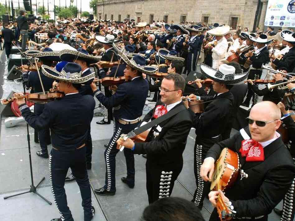 "Can we play a song for you while you dine?" A few of the 549 Mariachis who performed to break the Guinness World Record of The Number of Mariachis Playing At The Same Time on August 30, 2009 in Guadalajara, Mexico. "Can we play a song for you while you dine?" A few of the 549 Mariachis who performed to break the Guinness World Record of The Number of Mariachis Playing At The Same Time on August 30, 2009 in Guadalajara, Mexico.