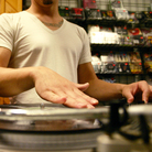 DJ Miguel Emmanuelli scratches a record at CD Connection in Jacksonville Beach, Fla., in 2008. DJ Miguel Emmanuelli scratches a record at CD Connection in Jacksonville Beach, Fla., in 2008.