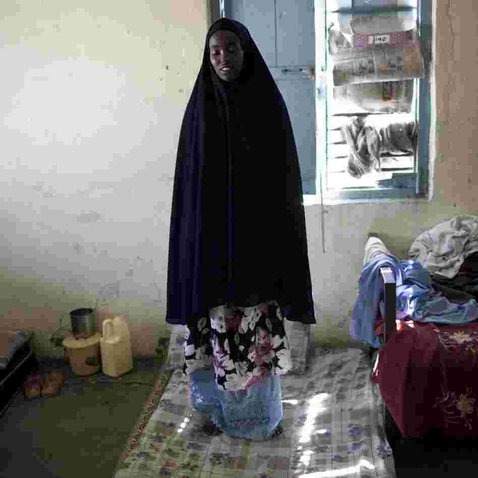 A young woman stands silently on her bed in the Hargeisa mental hospital, the only such hospital in all of Somaliland. Maybe people are still affected by the breakway war with Somalia.