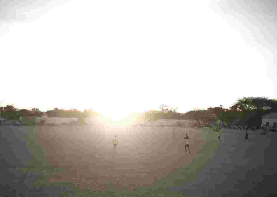 Men play soccer in Hargeisa.
